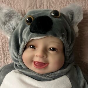 Reborn doll in koala costume